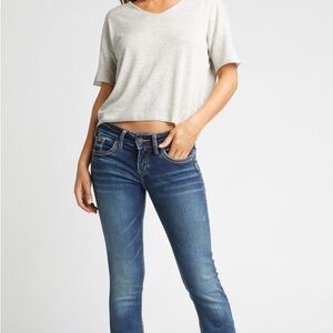 Silver Mid rise Suki Slim Boot gently used 28